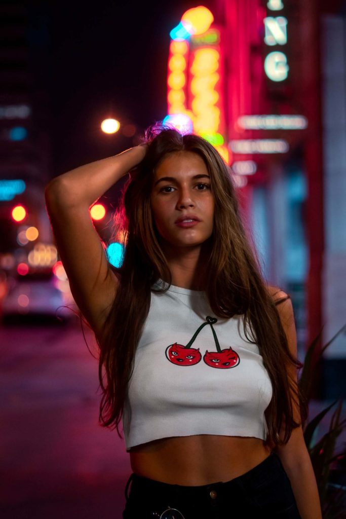 Indiana University Indianapolis IUPUI Creative Portrait Photo Photography Brandon Woeful Neon Lights Light Colorful Bokeh Model Glasses Reflection Cinematic Teal Orange CyberPunk Futuristic